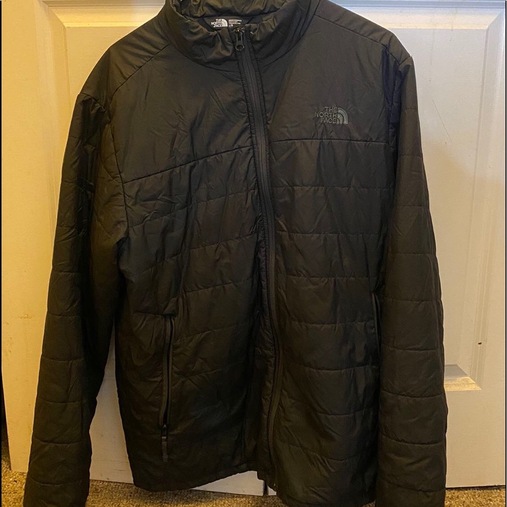 Black hoodless north face jacket